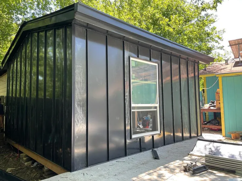 Black standing seam metal wall panels for Metal Roof Installation in Selma